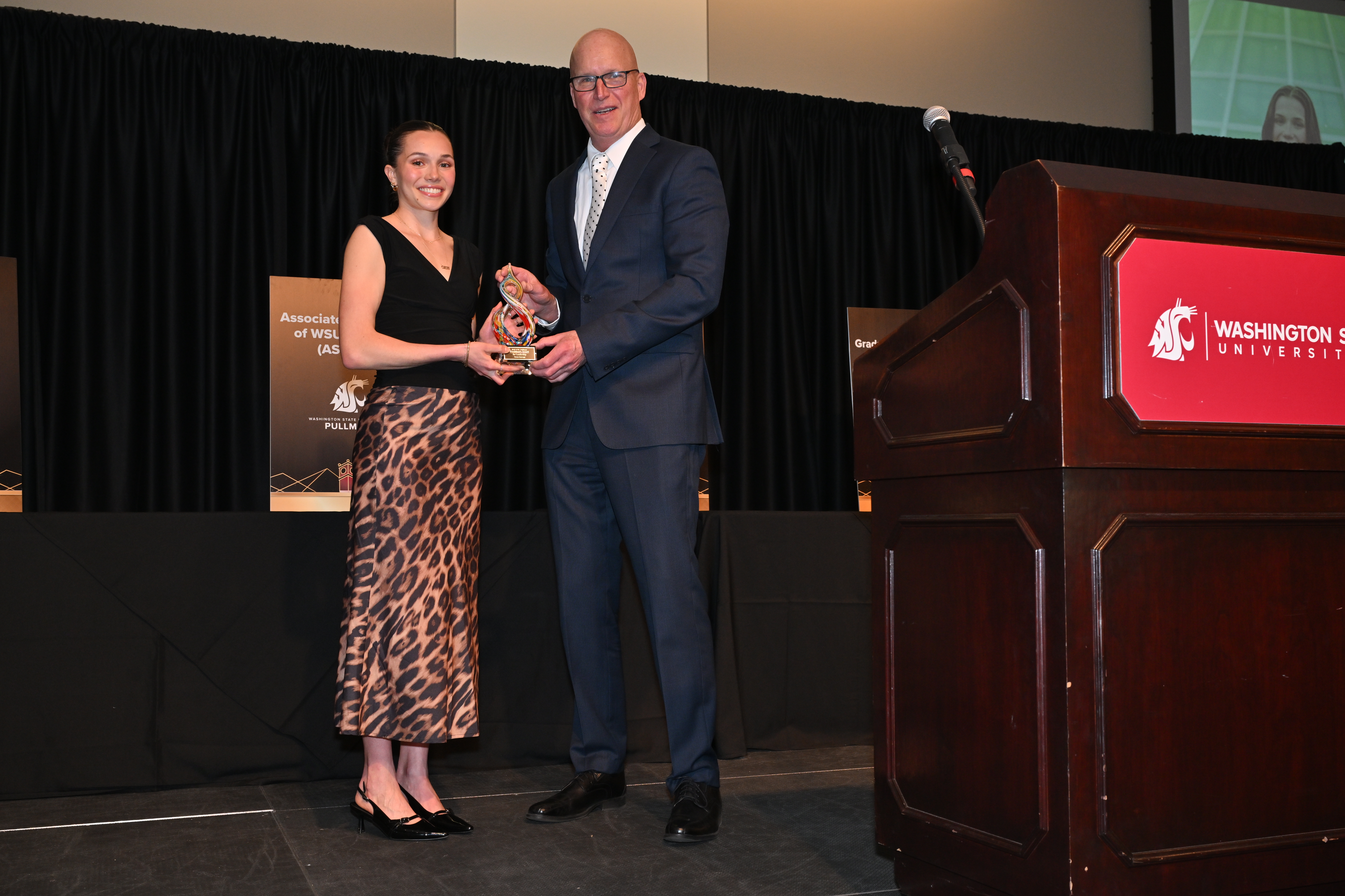 Grace Sauvage receives their 2025 President's Award for Leadership.