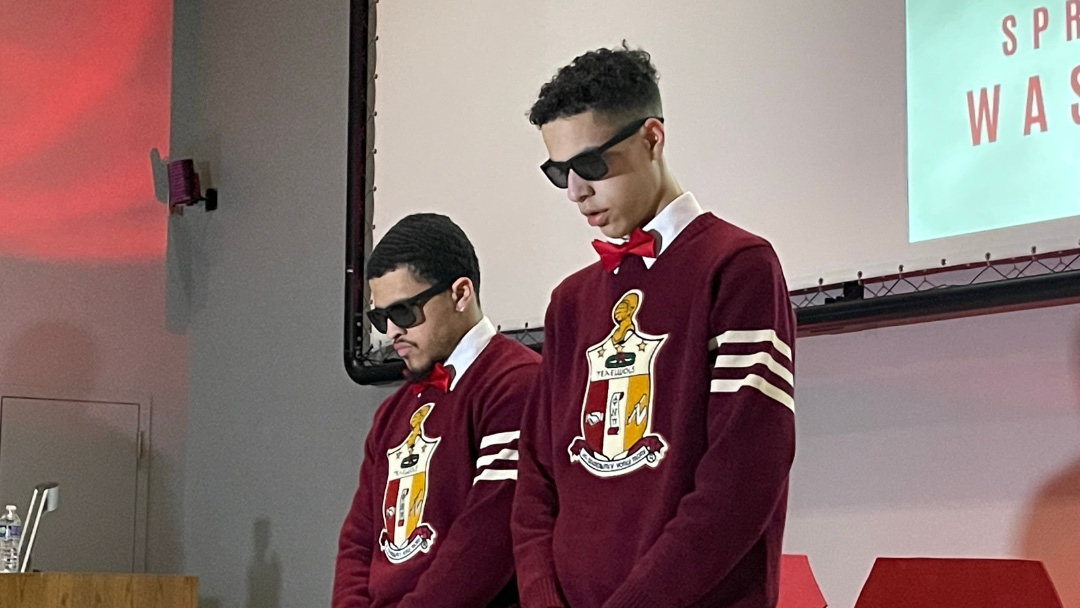 two fraternity members during performance
